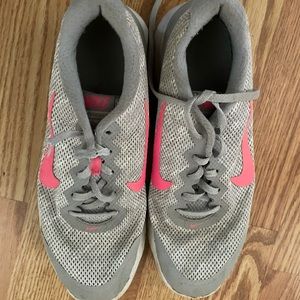 Grey and pink Nike’s 8.5